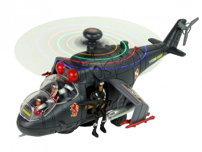 Helikoptéra s obrovskými křídly a světelnými efekty