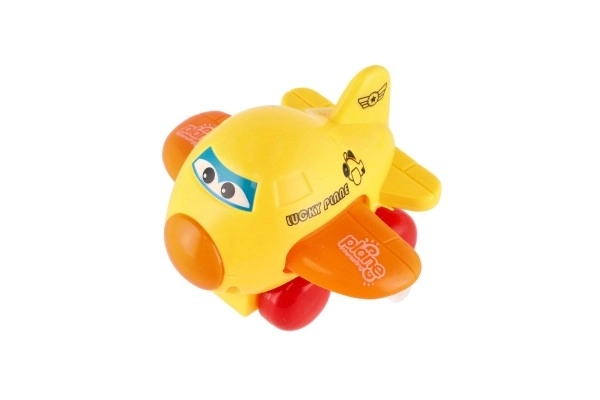 Letadlo s očima mávající křídla na klíček plast 8cm mix barev