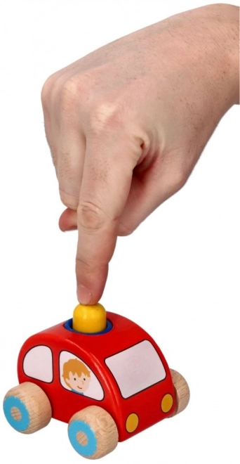 Červené auto s klaksonem