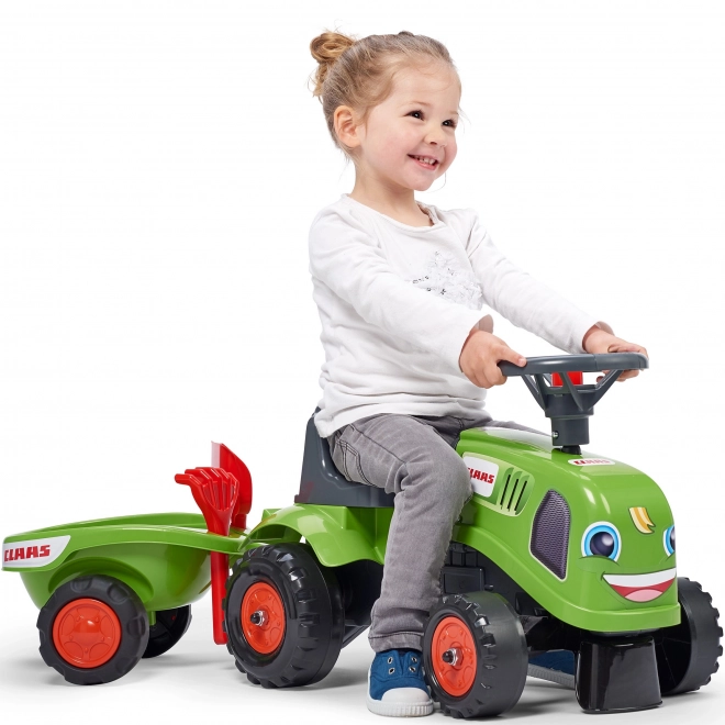 Odstrkovadlo traktor Claas zelené s volantem a valníkem