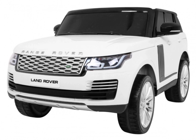 Range Rover HSE 2místné dětské auto bílé + dálkové ovládání + 5 ks pásů + audio panel + LED dioda
