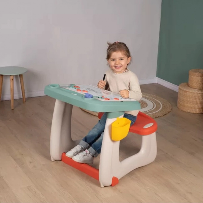 Smoby oboustranný dětský psací stůl s lavičkou a tabulí 2v1 + 80 doplňků