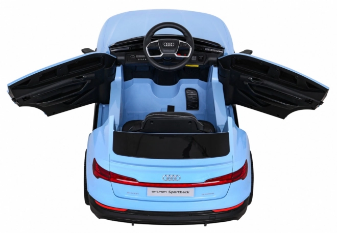 Audi E-Tron Sportback pentru copii + Pilot + tracțiune 4x4 + pornire lentă + radio MP3 + LED – Modrá