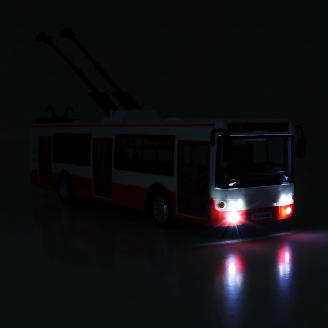 Trolejbus česky mluvící plast 29cm červený volný chod na bat. se světem se zvukem v krab. 33x11x10cm