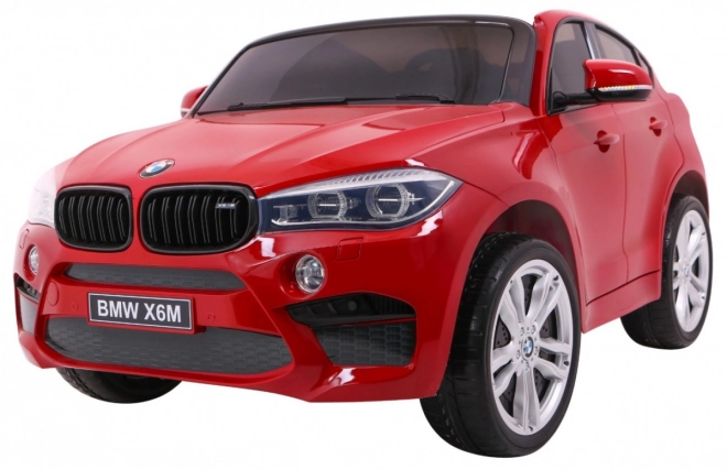 BMW X6M XXL pro 2 děti Červený lak + dálkové ovládání + eko kůže + bezpečnostní pásy + pomalý rozjezd + MP3 + LED