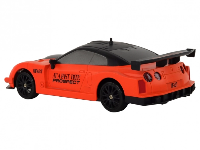 Dálkově ovládané R/C sportovní auto 1:24 Oranžová vyměnitelná kola