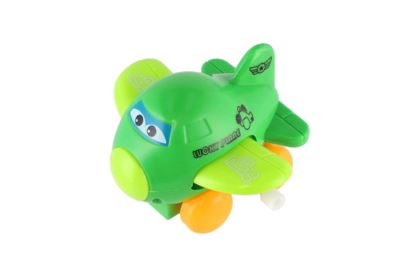 Letadlo s očima mávající křídla na klíček plast 8cm mix barev