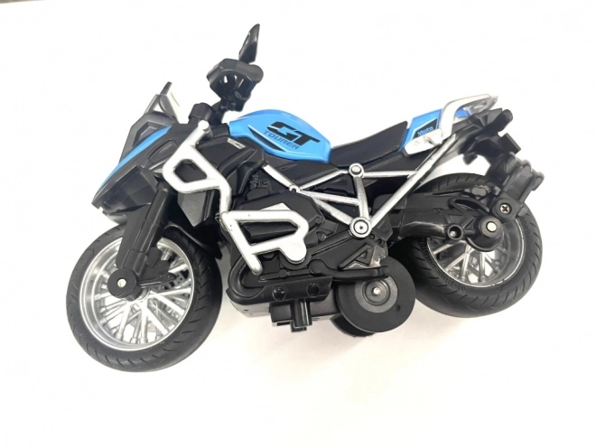 Závodní motorka s pružinovým pohonem
