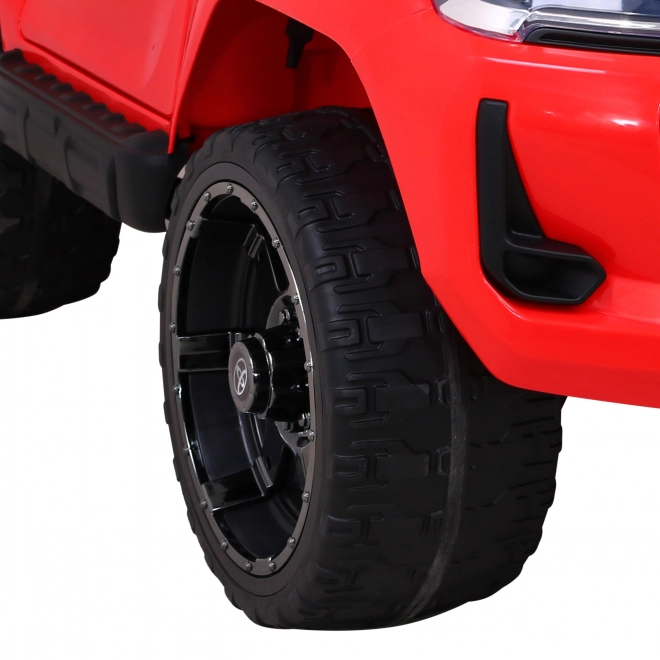 Toyota Hilux baterie pro děti Červená + pohon 4x4 + dálkové ovládání + 2 nosiče zavazadel + rádio MP3 + LED dioda