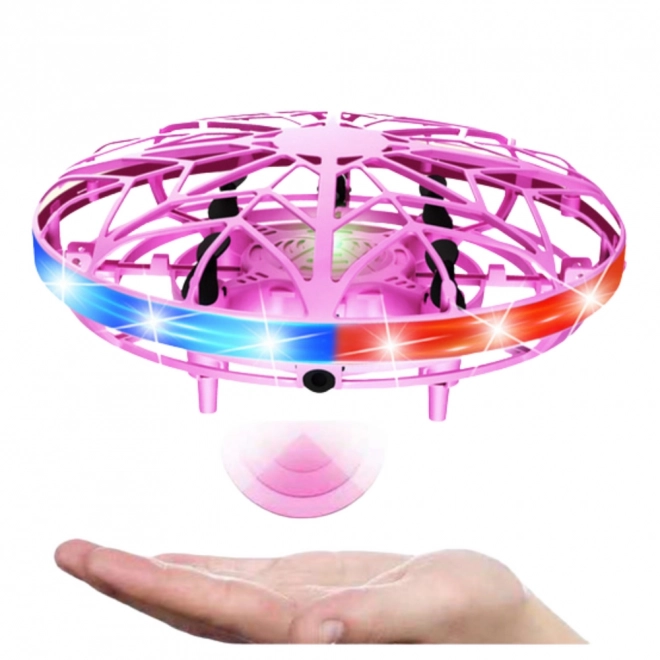 Růžový ručně ovládaný UFO dron s LED světly