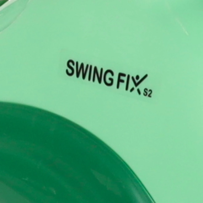 Zelený jezdicí hračka Swing Fix pro děti