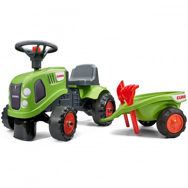 Odstrkovadlo traktor Claas zelené s volantem a valníkem