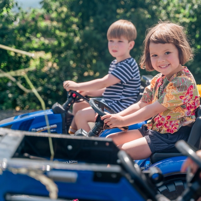 Traktor šlapací New Holland T8 s valníkem a přední lžící mod