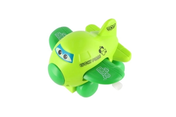 Letadlo s očima mávající křídla na klíček plast 8cm mix barev