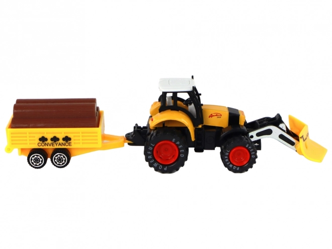 Traktor s přívěsem žlutý červený