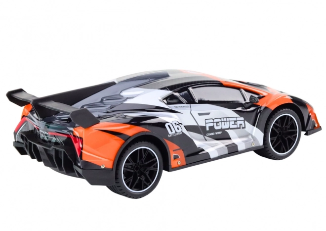 Dálkově ovládané RC sportovní auto 1:10 oranžové Rychlost 25 km/h