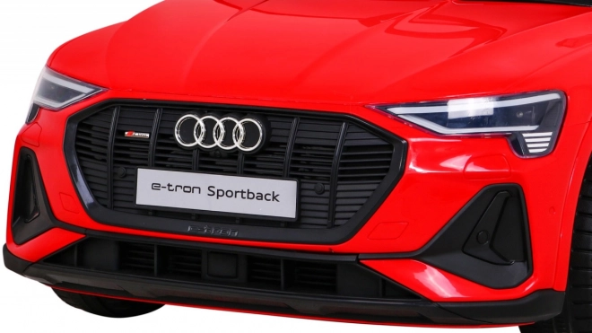 Audi E-Tron Sportback pentru copii + Pilot + tracțiune 4x4 + pornire lentă + radio MP3 + LED – Červená