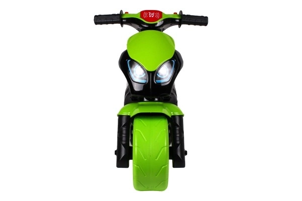 Zeleno-černé dětské odrážedlo motorka