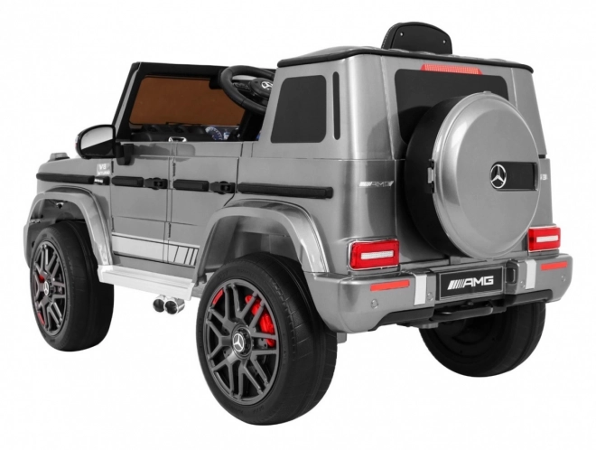 Mercedes AMG G63 pro děti Stříbrný lak + dálkové ovládání + MP3 LED + pomalý start + EVA + pásy