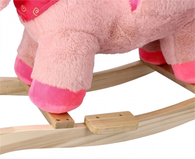 Růžový jednorožec se sedačkou do auta
