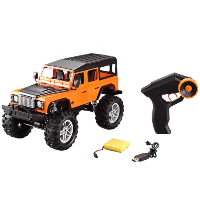 Dálkově ovládané auto Land Rover Defender 1:14 oranžové