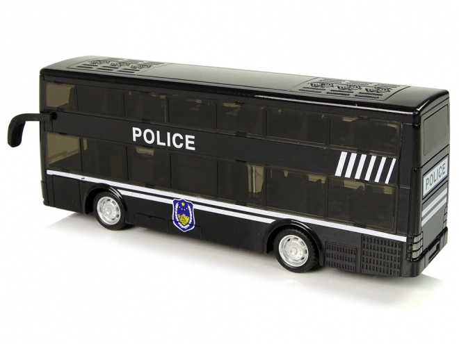 Policejní dvoupatrový černý autobus s třecím pohonem