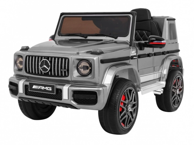 Mercedes AMG G63 pro děti Stříbrný lak + dálkové ovládání + MP3 LED + pomalý start + EVA + pásy