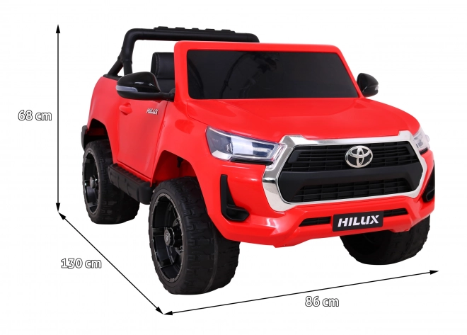Toyota Hilux baterie pro děti Červená + pohon 4x4 + dálkové ovládání + 2 nosiče zavazadel + rádio MP3 + LED dioda