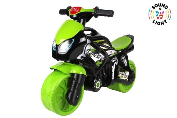 Zeleno-černé dětské odrážedlo motorka