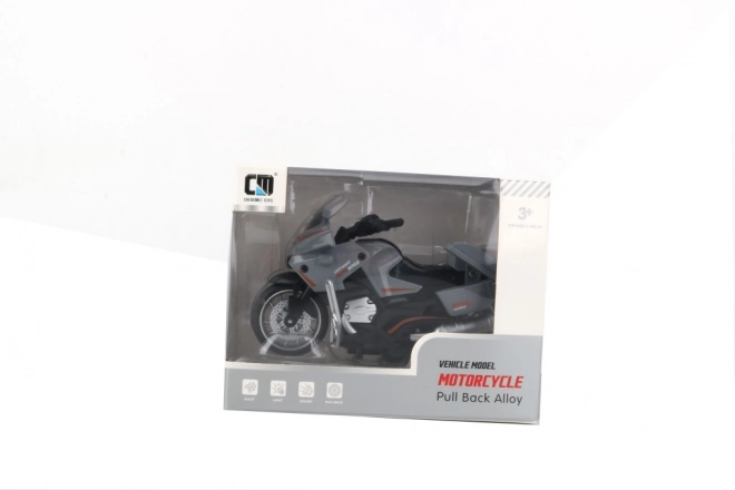 Šedá motorka s funkcí pull-back