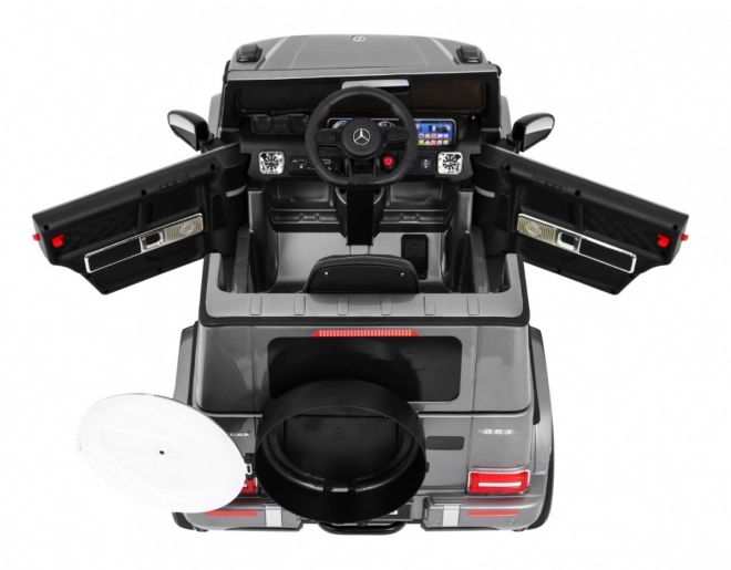 Mercedes AMG G63 pro děti Stříbrný lak + dálkové ovládání + MP3 LED + pomalý start + EVA + pásy