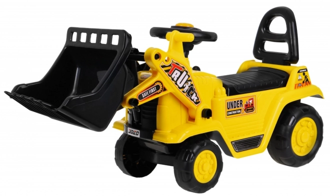 Dětský šlapací buldozer s helmou