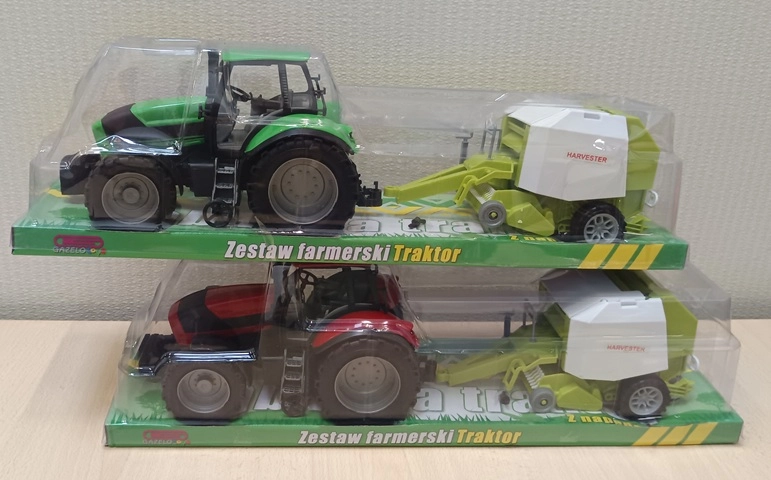 Traktor se zemědělským strojem