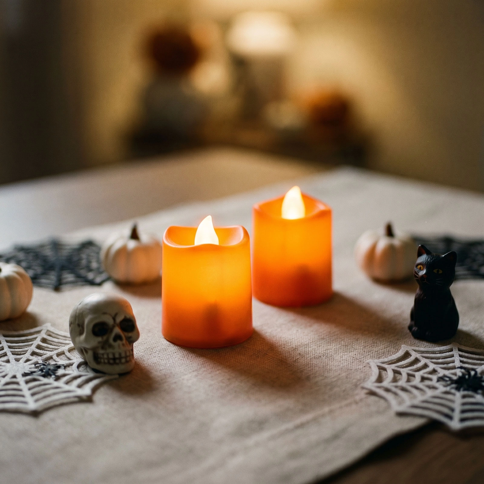 Halloweenová svítící LED svíčka oranžová, 2 ks