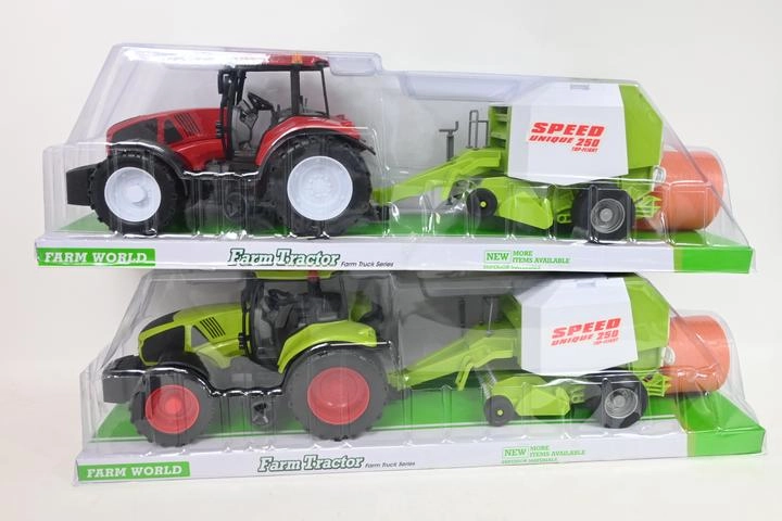 Velký traktor s lisem na balíky