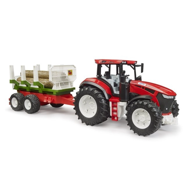 Traktor s přívěsem na klády
