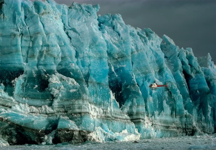 Levně Puzzle 1000 dílků CLEMENTONI National Geographic – vrtulník u stěny Hubba
