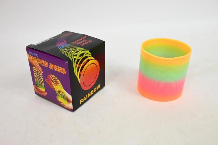 Duhová pružina slinky v krabičce