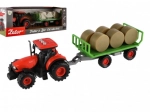 Traktor se zvukem a světlem s odpojitelným vlekem a balíky sena