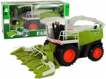 Velký zelený kombajn s pohyblivými částmi