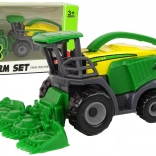 Zelený malý zemědělský kombajn – hračka