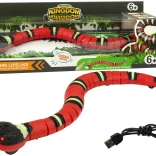 Interaktivní dotykem ovládaný had červený s černými pruhy