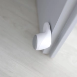 Bílá dětská ochrana proti skřípnutí dveří